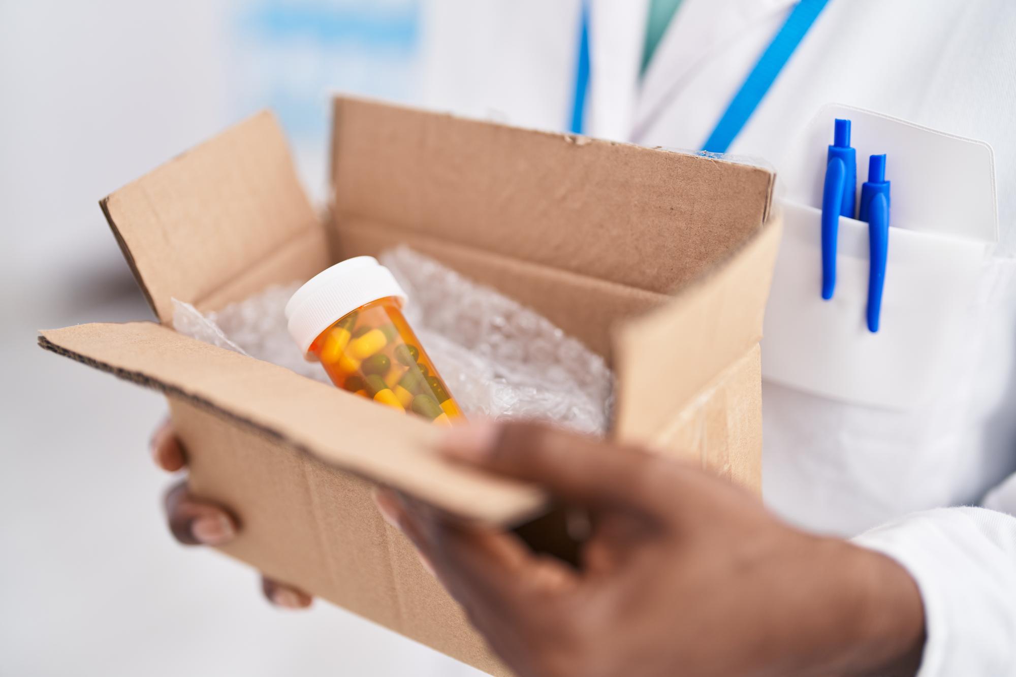 pharmacist-holding-box